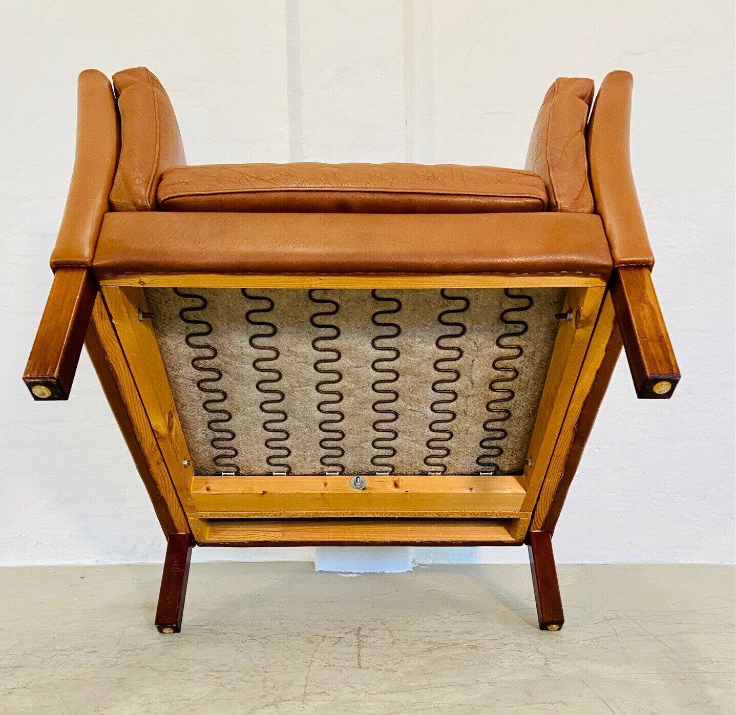 Fauteuil lounge scandinave vintage en cuir cognac, style milieu du siècle
