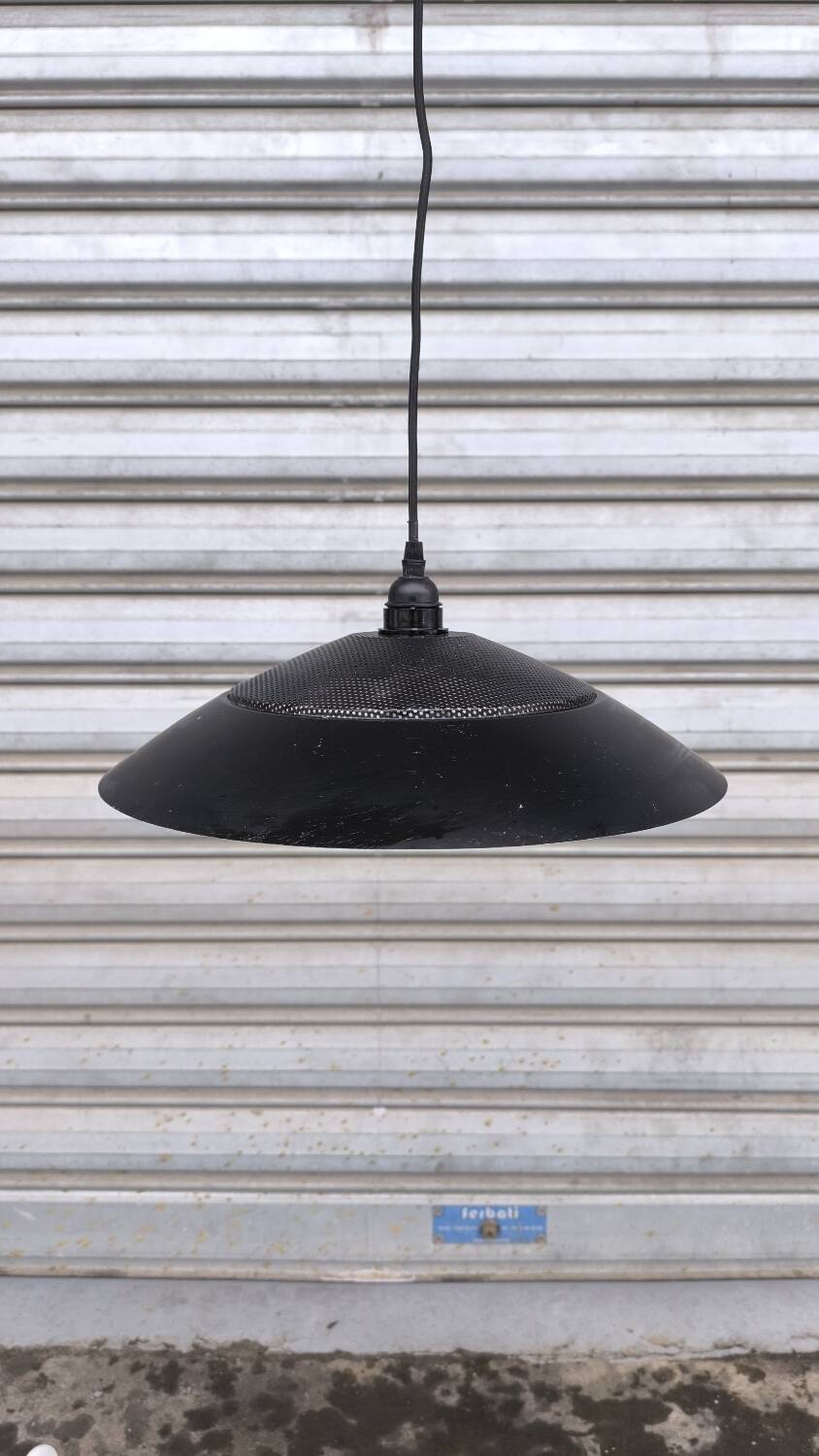 Perforated lacquered sheet metal suspension from the 90s