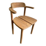 Retro solid wood chair with brutalist style armrest