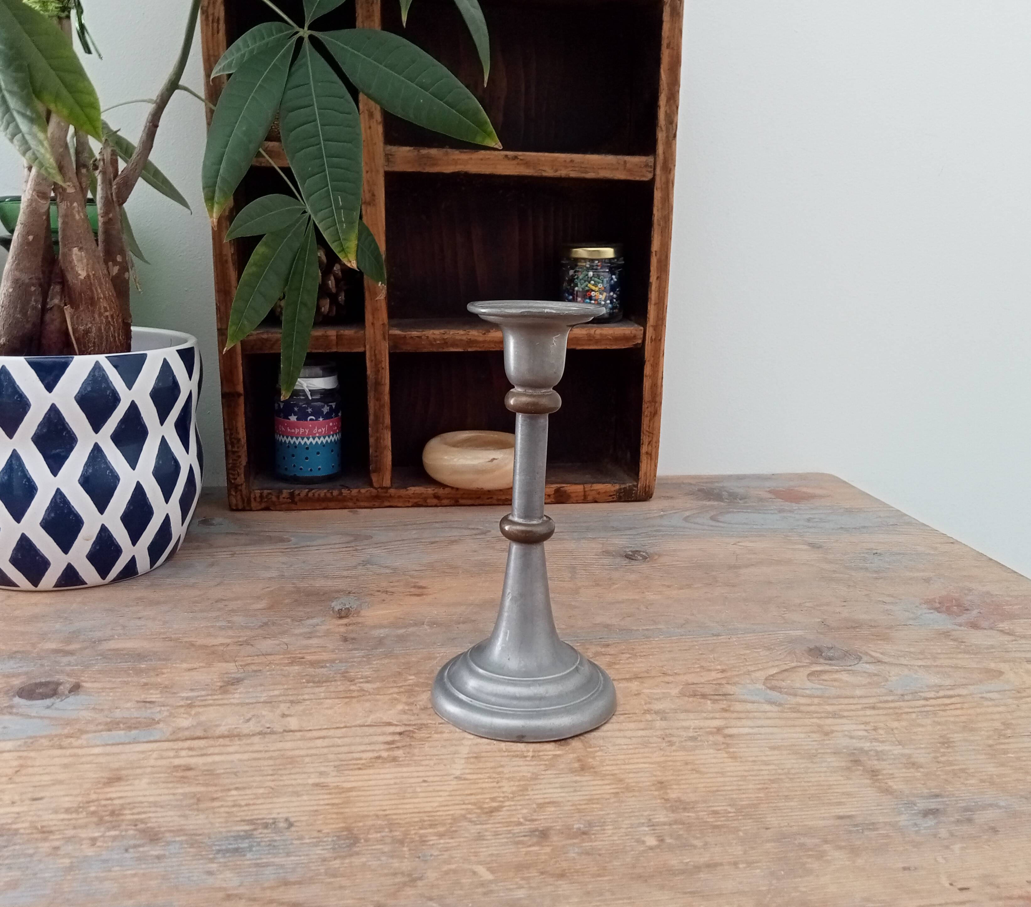 Antique candle holder in pewter and brass
