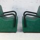 Pair of armrest heaters. Steel and green imitation leather. France, circa 1980
