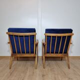 Boomerang" model armchairs by Ton