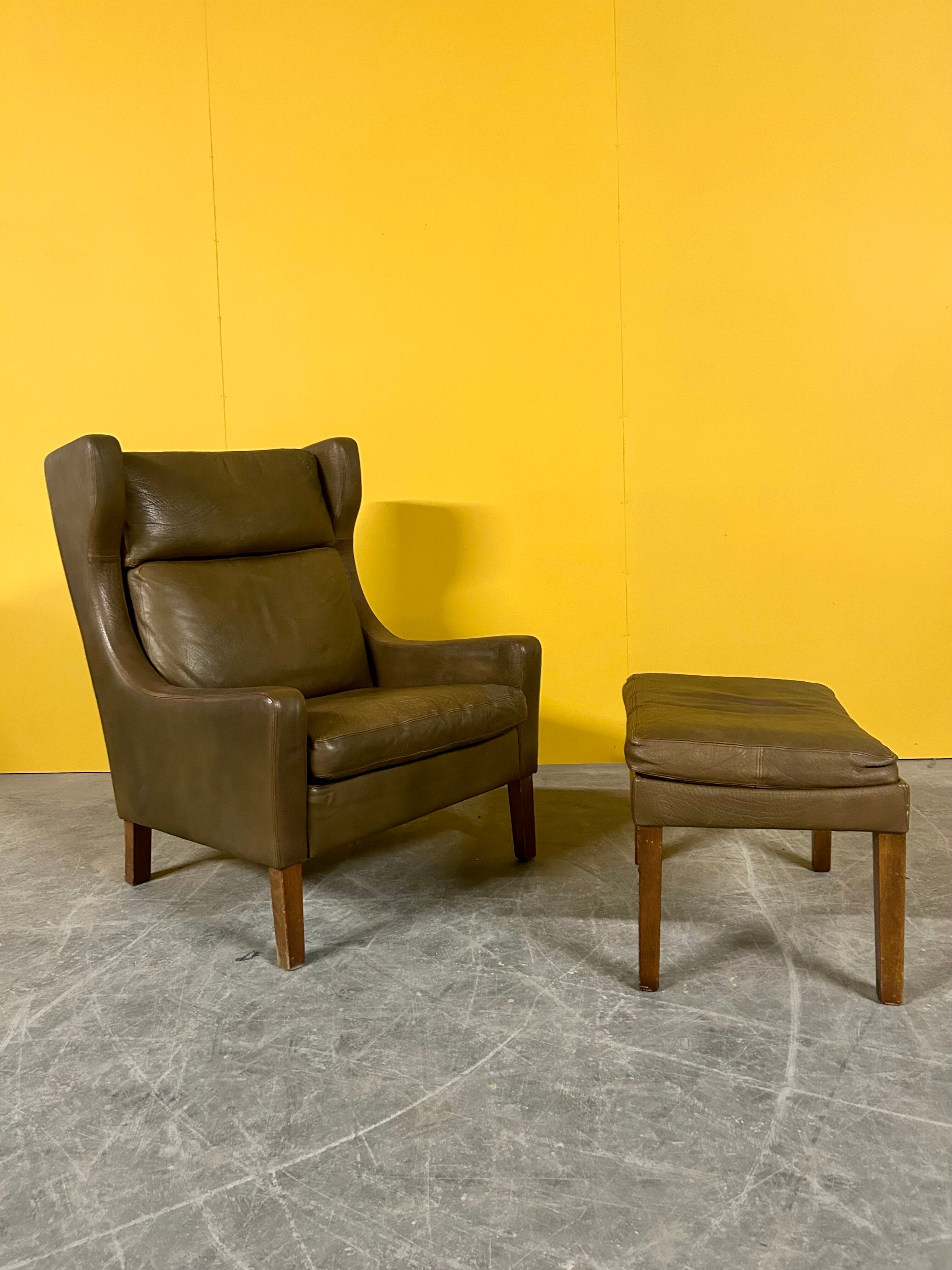 Fauteuil en cuir vintage danois à dossier haut années 1960