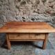 18th-century cherry wood coffee table with two drawers.