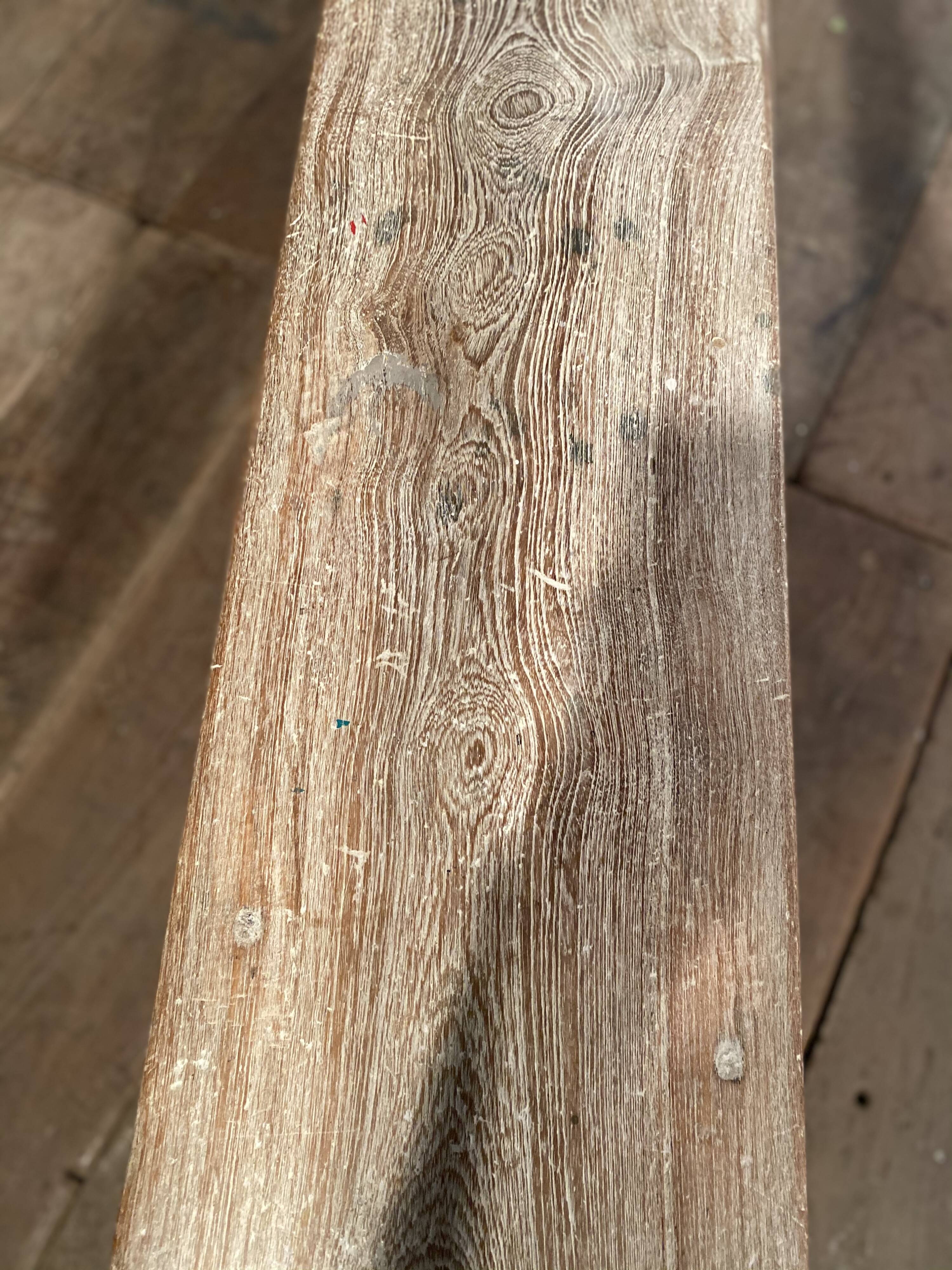 Former schoolboy bench made of raw wood