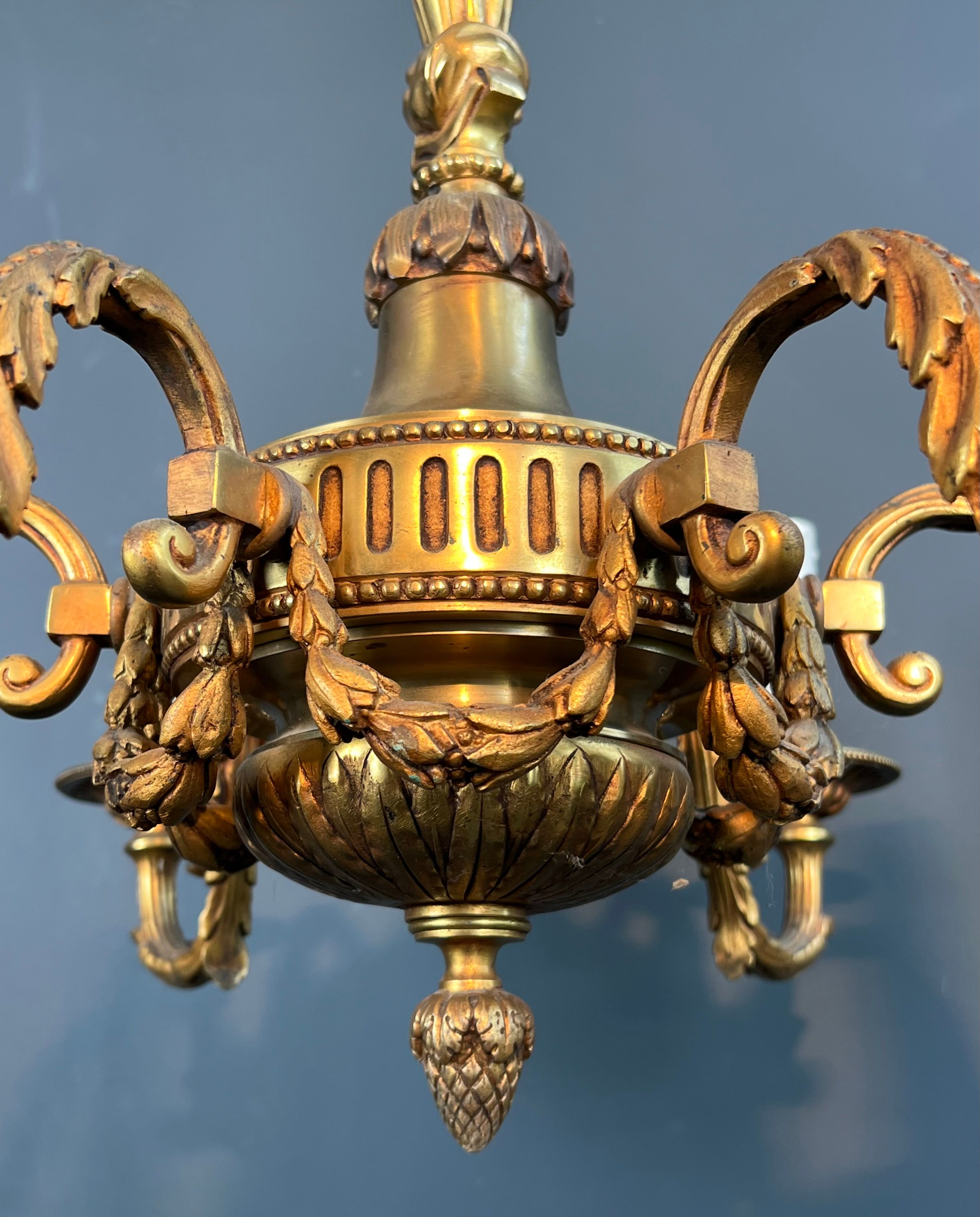 Bronze chandelier in Louis XVI style with 6 arms.