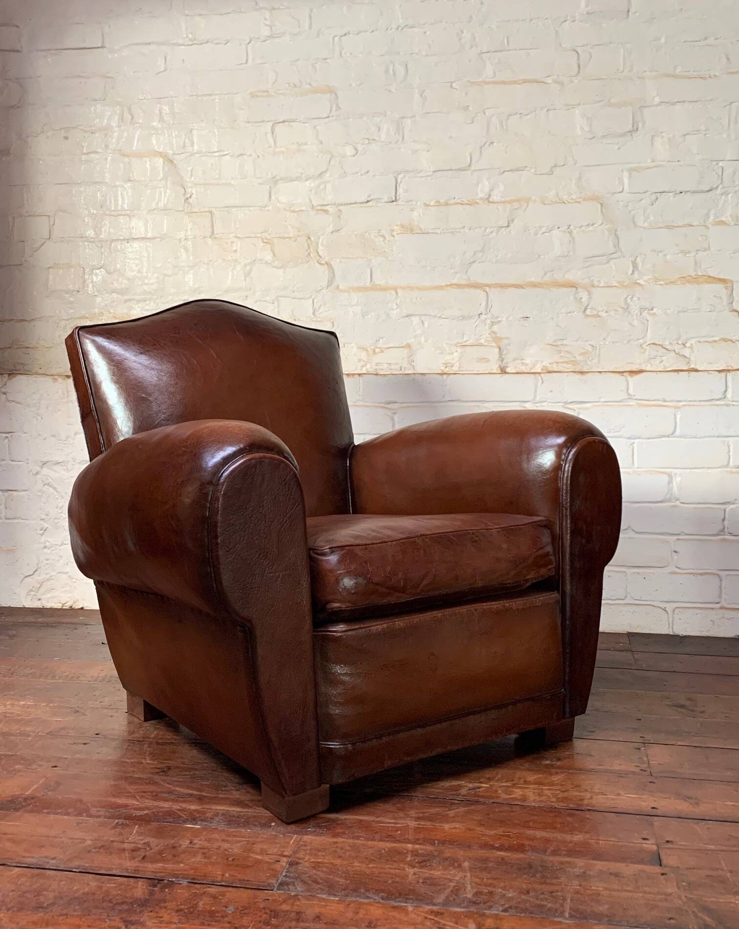 French leather club chair, chapeau de gendarme model circa 1950’s