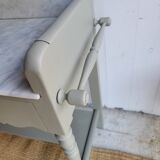 Antique wooden dressing table with marble top and mirror.