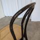 Chaise de salle à manger vintage en bois cintré : siège en osier noir de style Thonet