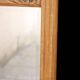 Art Deco fireplace mirror in light oak. Mercury glass.