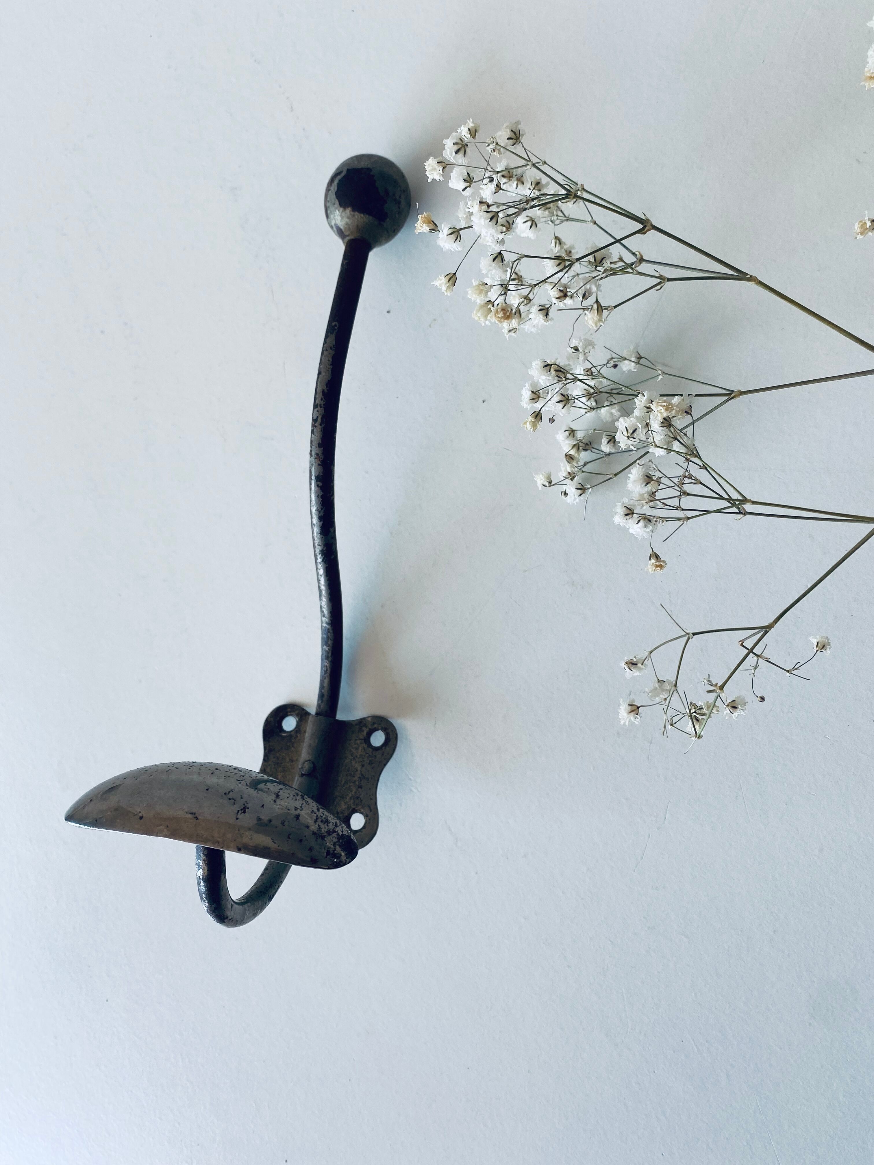 Ancient metal patère