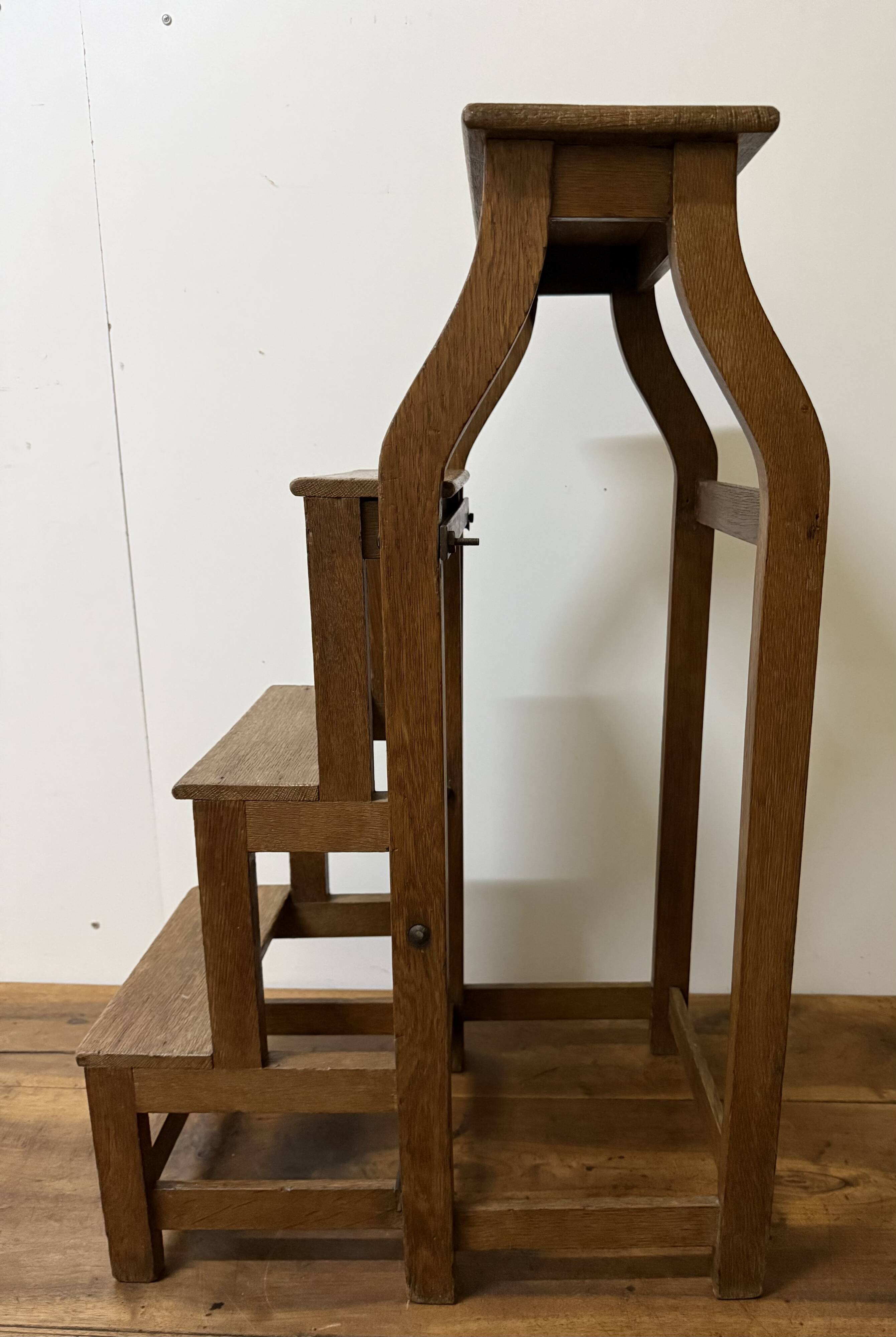 Stool transforming into a step ladder.