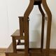 Stool transforming into a step ladder.