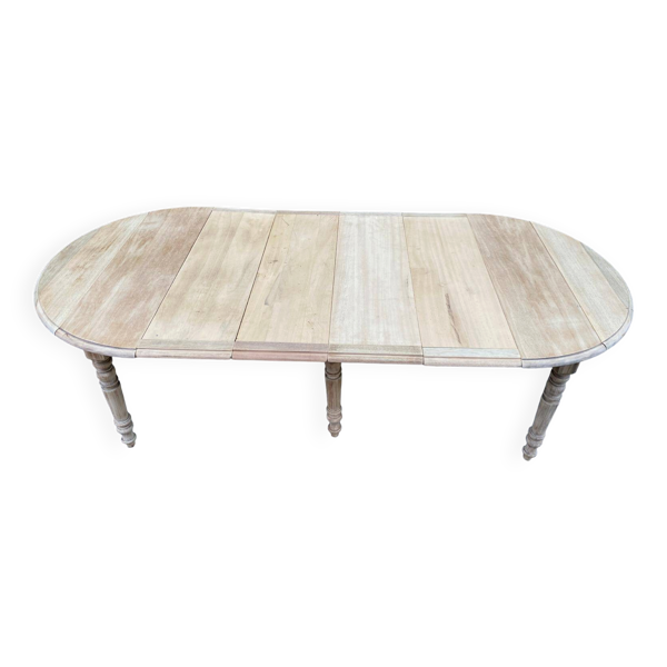 Table à manger ronde extensible à volets décapée en chêne brut 4 rallonges
