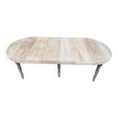 Table à manger ronde extensible à volets décapée en chêne brut 4 rallonges