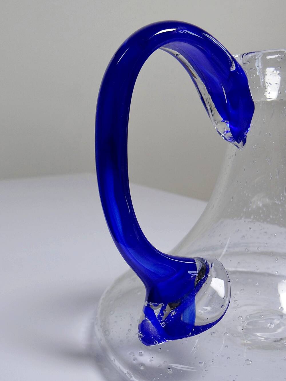 Bubble glass decanter with cobalt handle from Val de Pome Biot glassworks