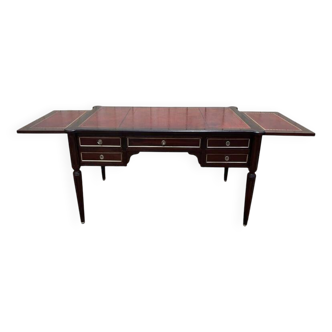 Bureau plat de style Louis XVI acajou et cuir rouge