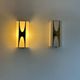 Pair of Loewy wall lights for Hilton, brass and Perspex, France 1965