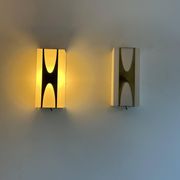 Pair of Loewy wall lights for Hilton, brass and Perspex, France 1965