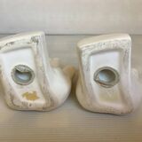 Paire de serre livres mains