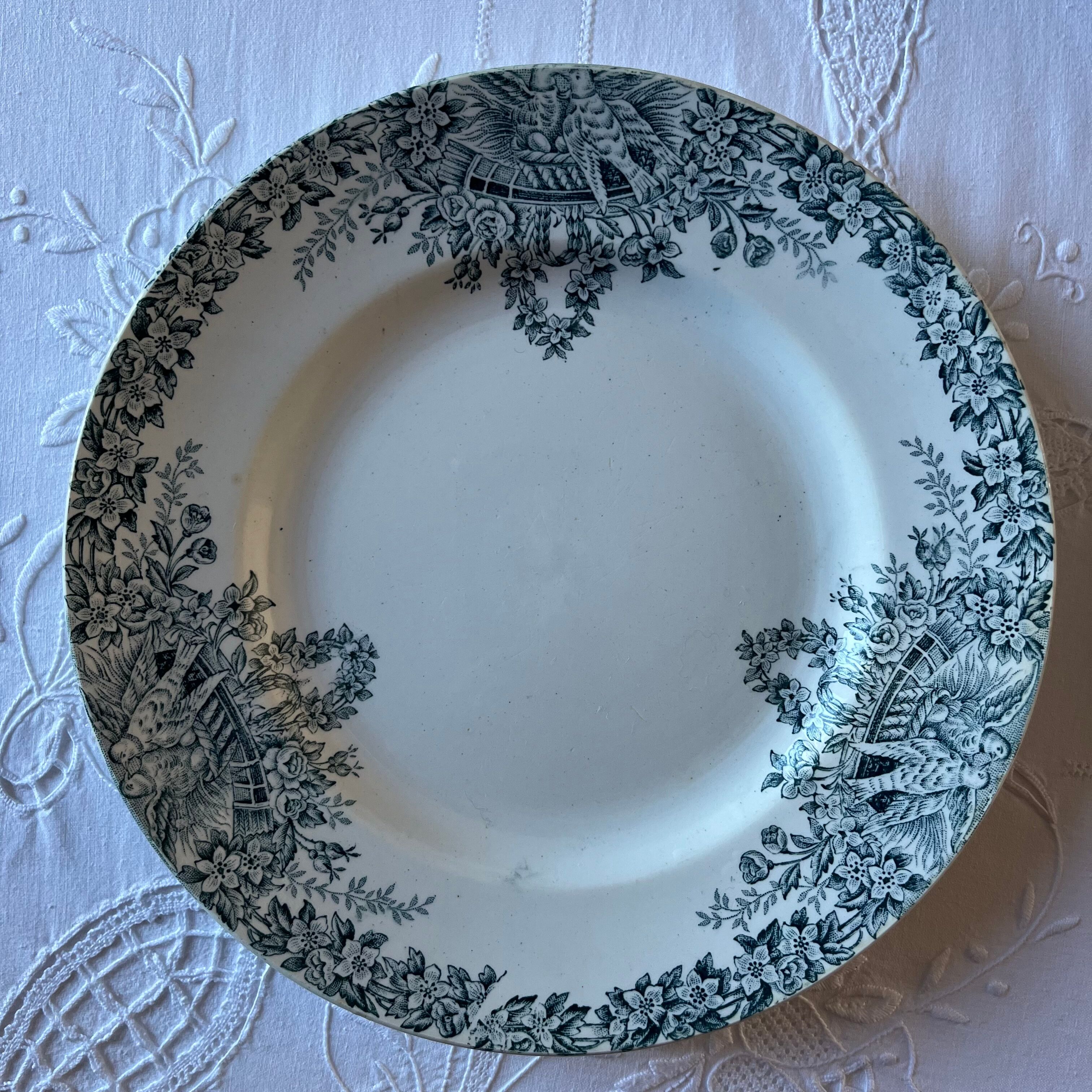 4 iron earth plates decorated with birds
