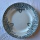 4 iron earth plates decorated with birds