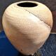 Glazed stoneware vase with a contemporary design, signed to be identified.