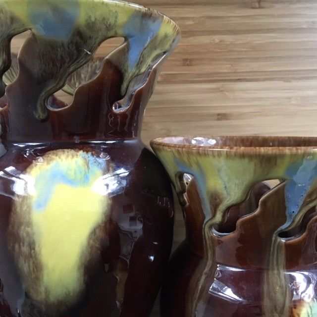 Pair of flaming ceramic vases