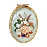 Frame domed glass flowers in fabric