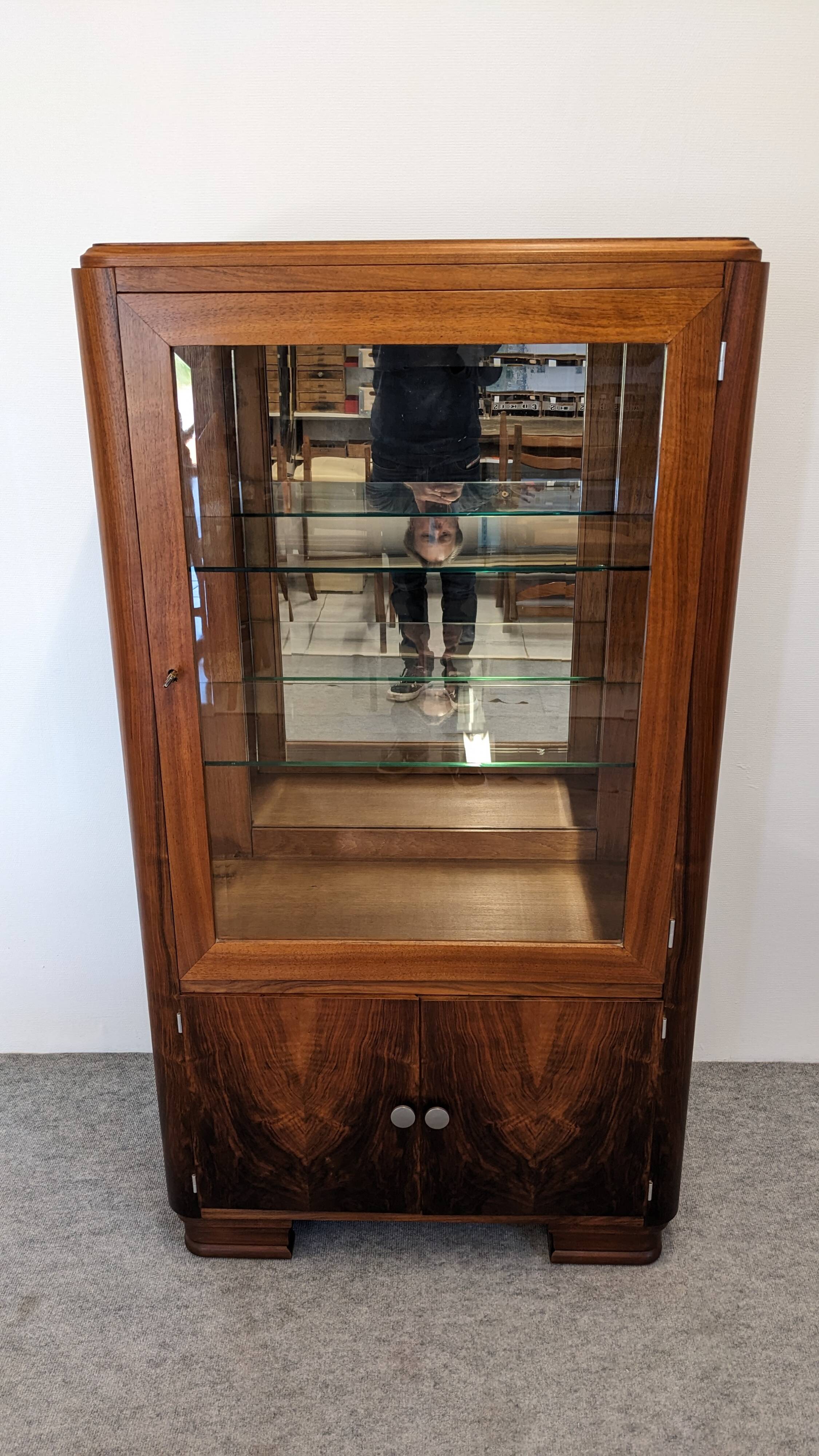 Art Deco walnut burl display cabinet, France circa 1930.
