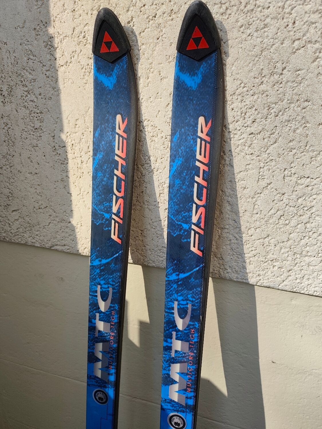 3 pairs of vintage skis: Rossignol Strato, ST 650 & Fischer.