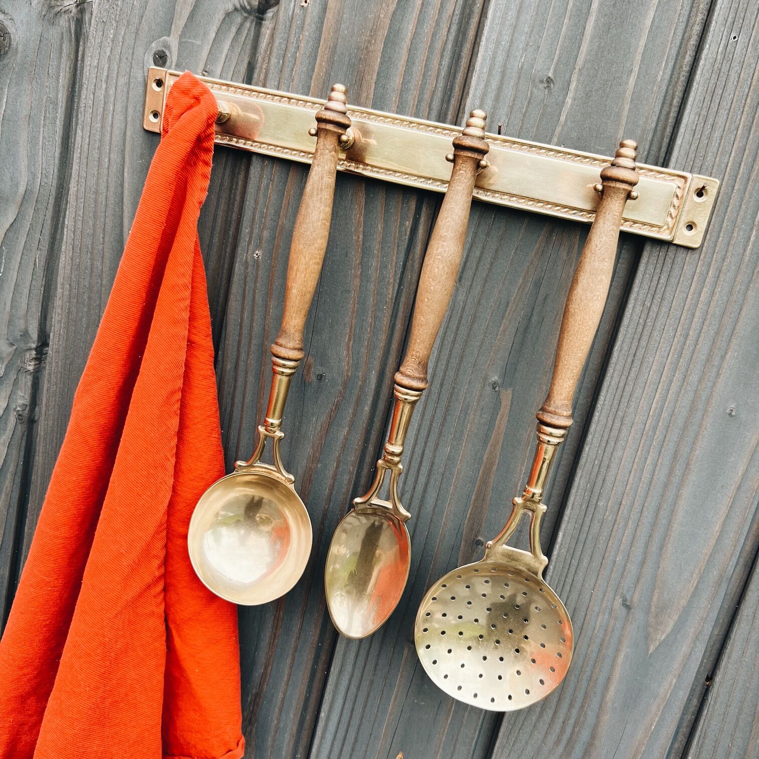 Brass holder with 3 brass & wood utensils