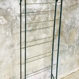 Rigid metal shoe shelf on legs - 1950