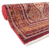Antique red oriental style carpet in wool