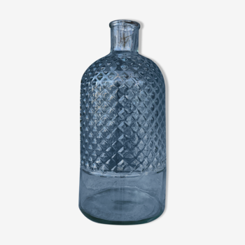 Recycled glass bottle with green water pegs
