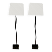 Pair of hammered black metal floor lamps with white shades.