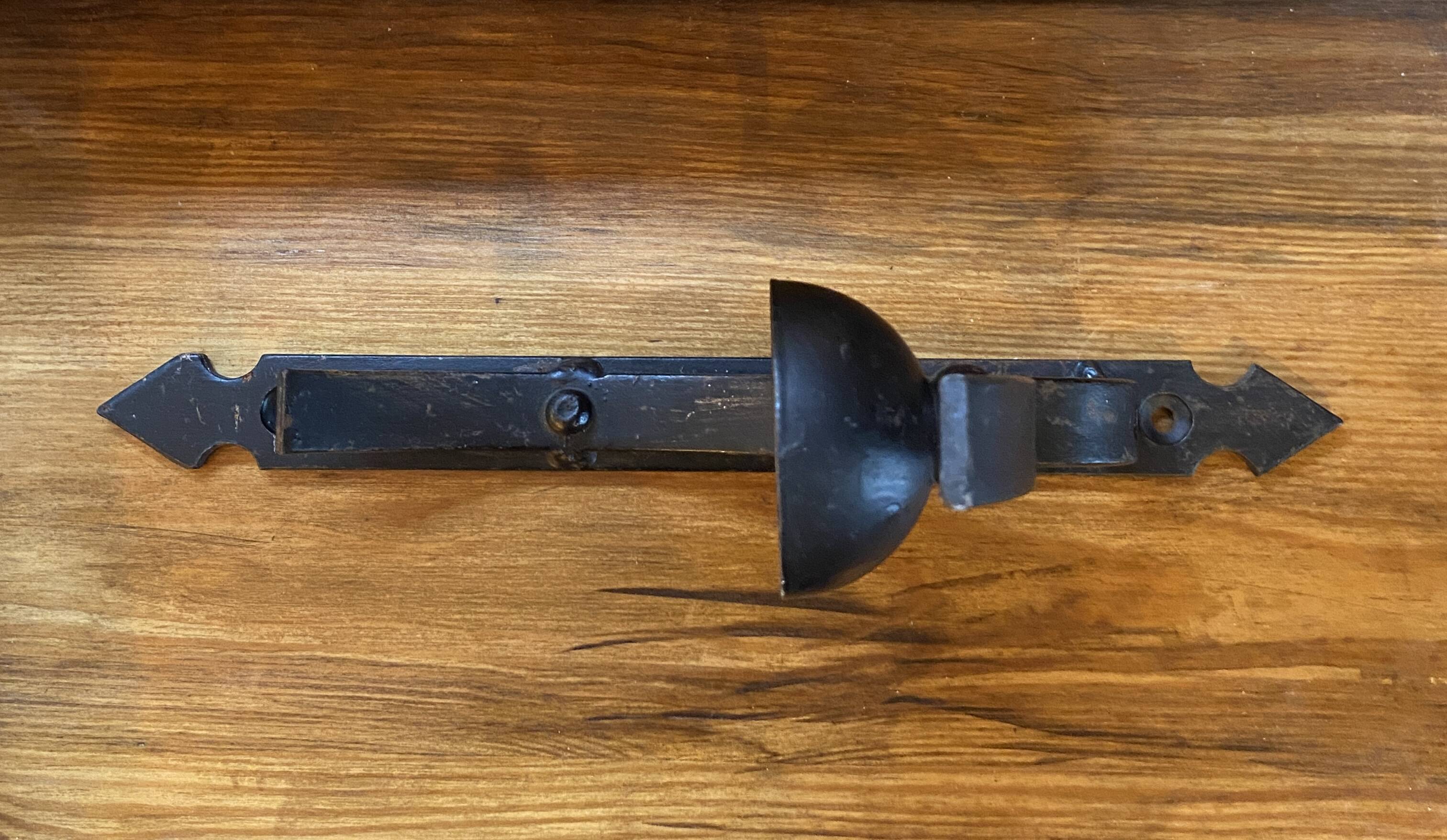 Wrought iron wall light, fabric cable