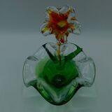 Cup has blown glass jewelry