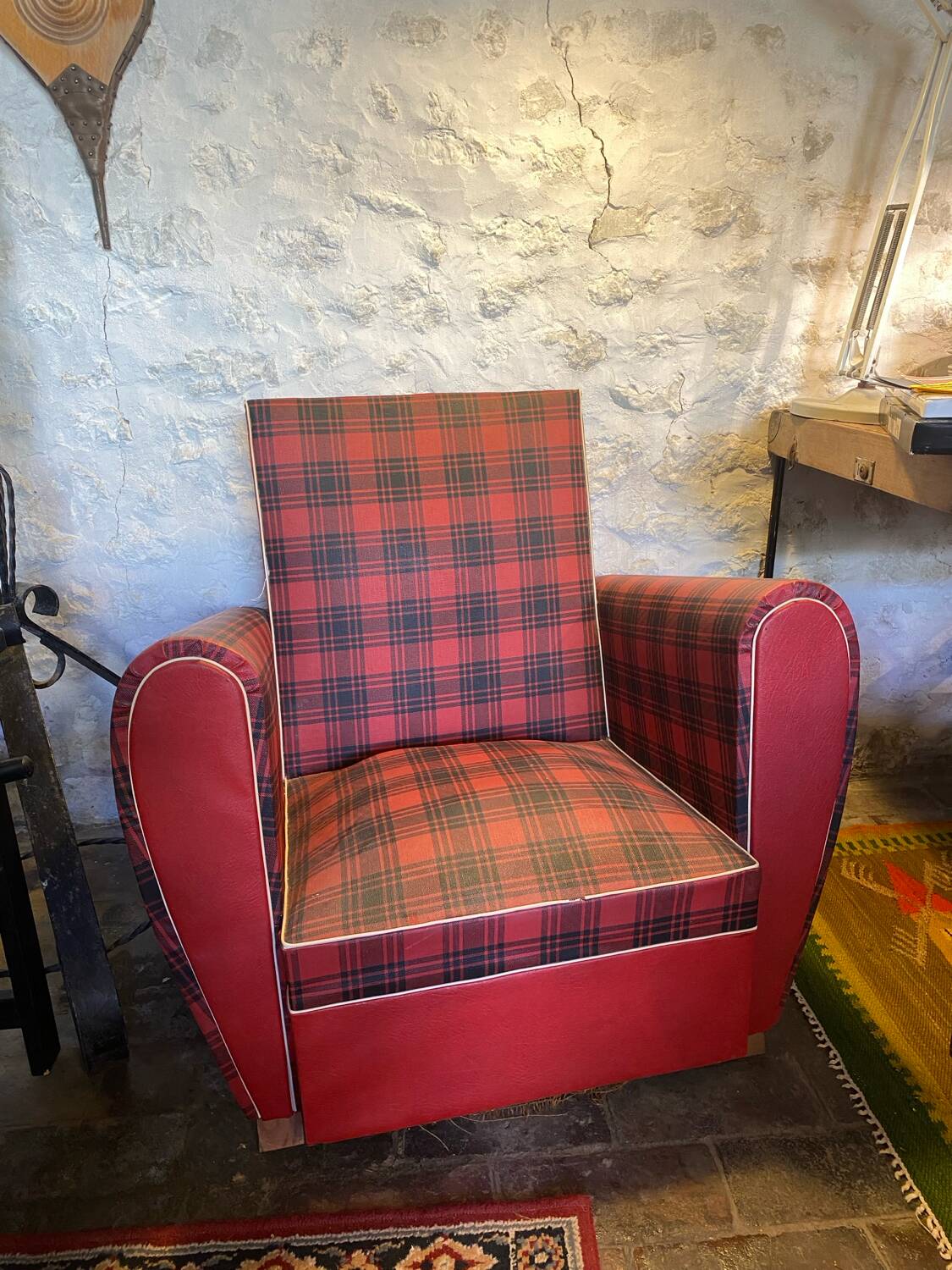 Red faux leather armchair