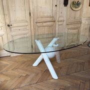 Dining table with glass top and marble base, Ligne Roset.