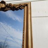 19th century mirror in wood and gilded stucco "scallop shell"