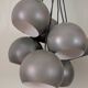 Khaki lamp with 7 bulbs.