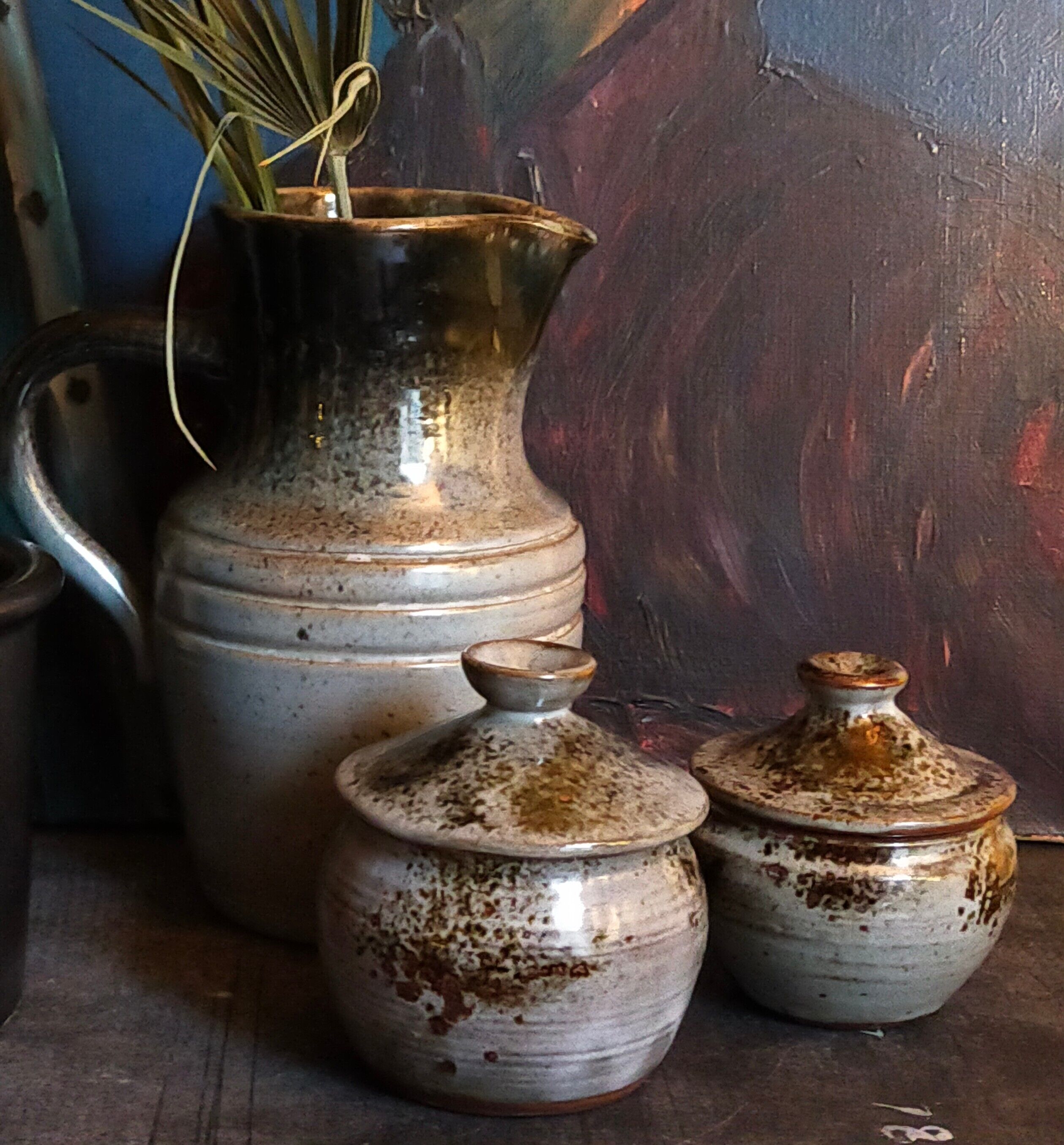 Duo of potter's pots covered in vintage glazed stoneware