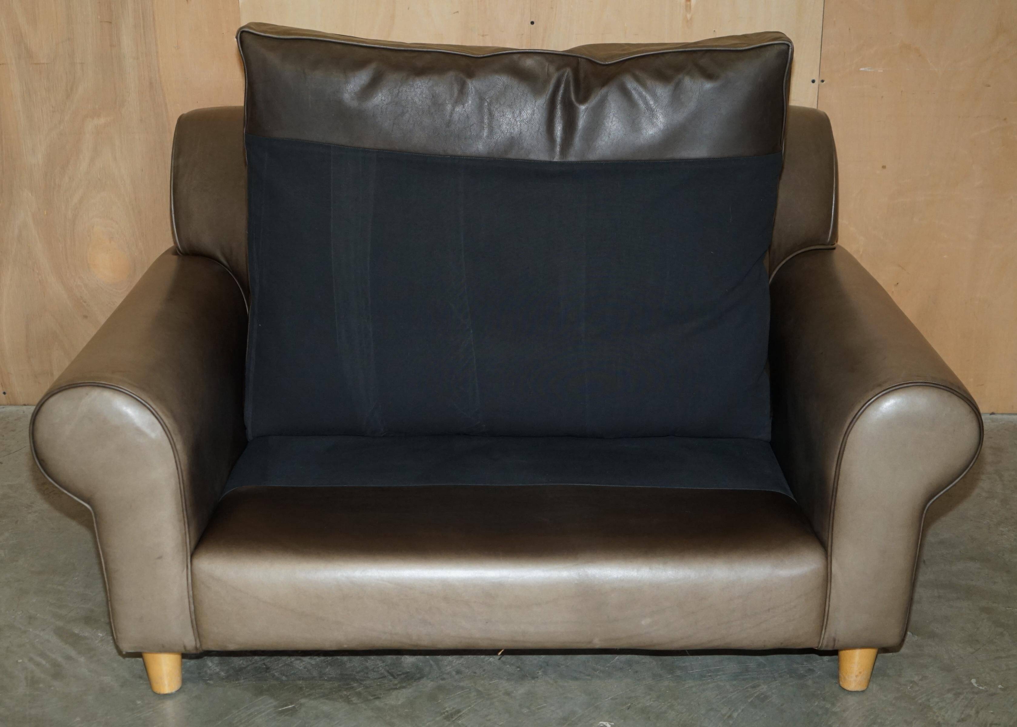 Large leather loveseat by Terence Conran
