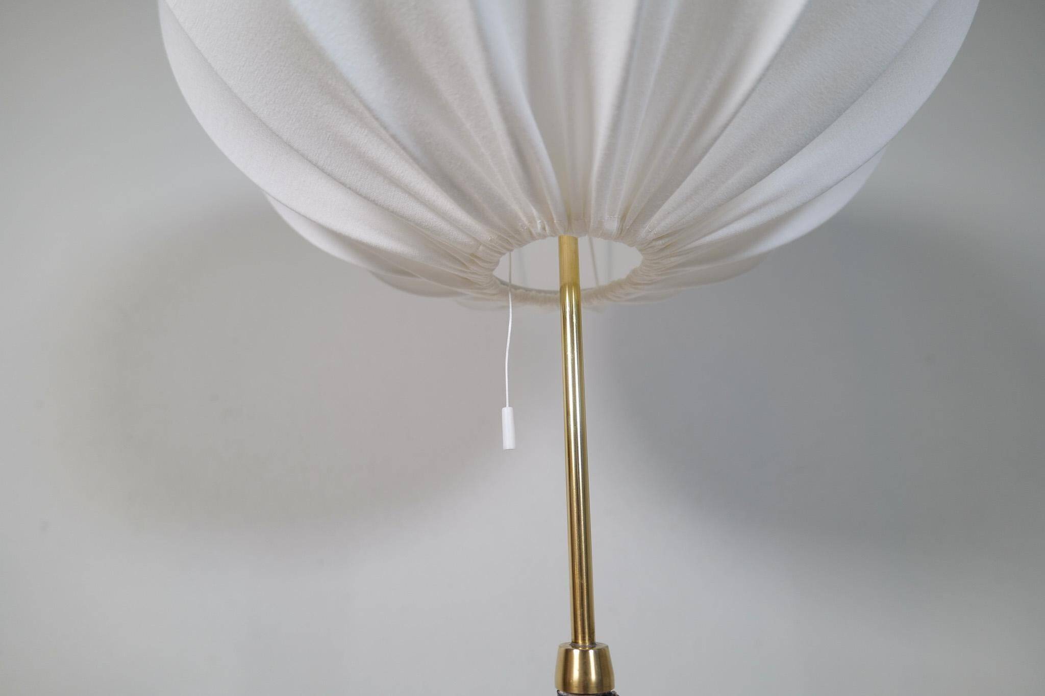 Mid-century black leather and brass floor lamp by Falkenbergs Belysning, Sweden, 1960s.