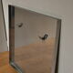 Round mirror with frame in stainless steel of the 1970s 60x60cm