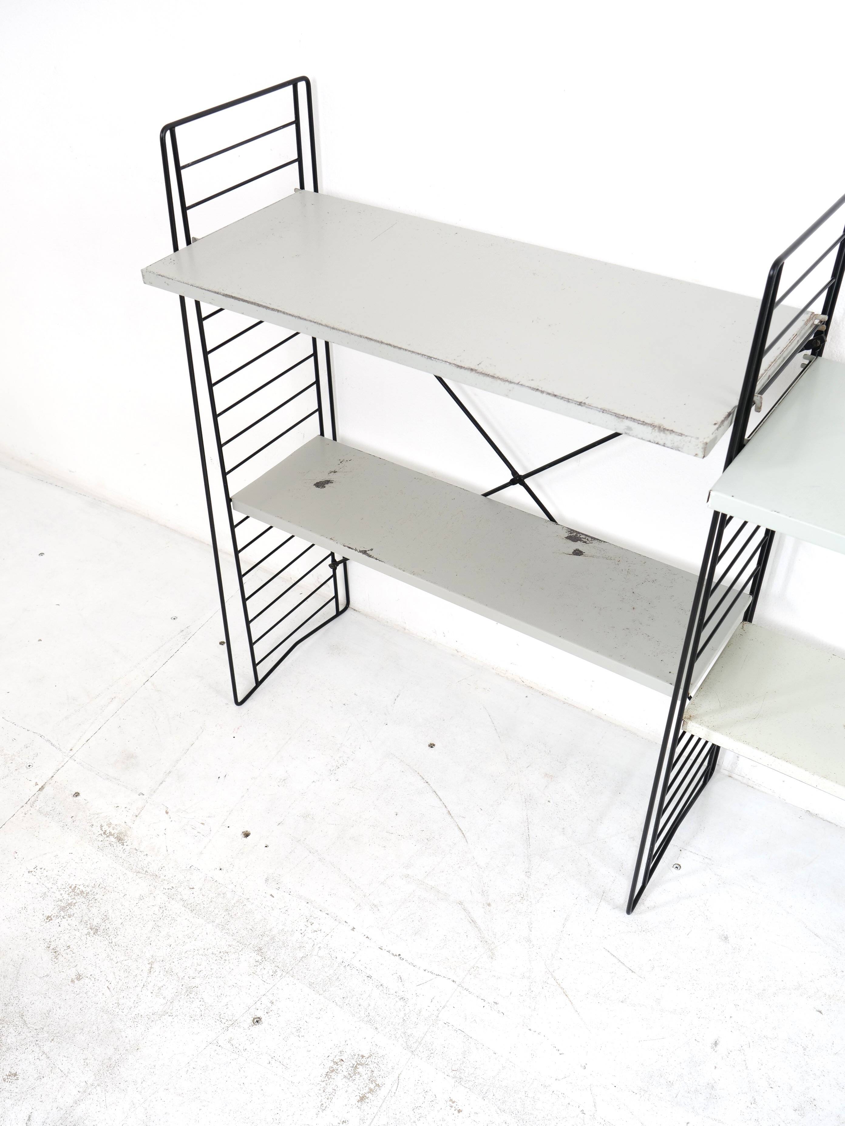 Tomado floor shelf in shades of gray