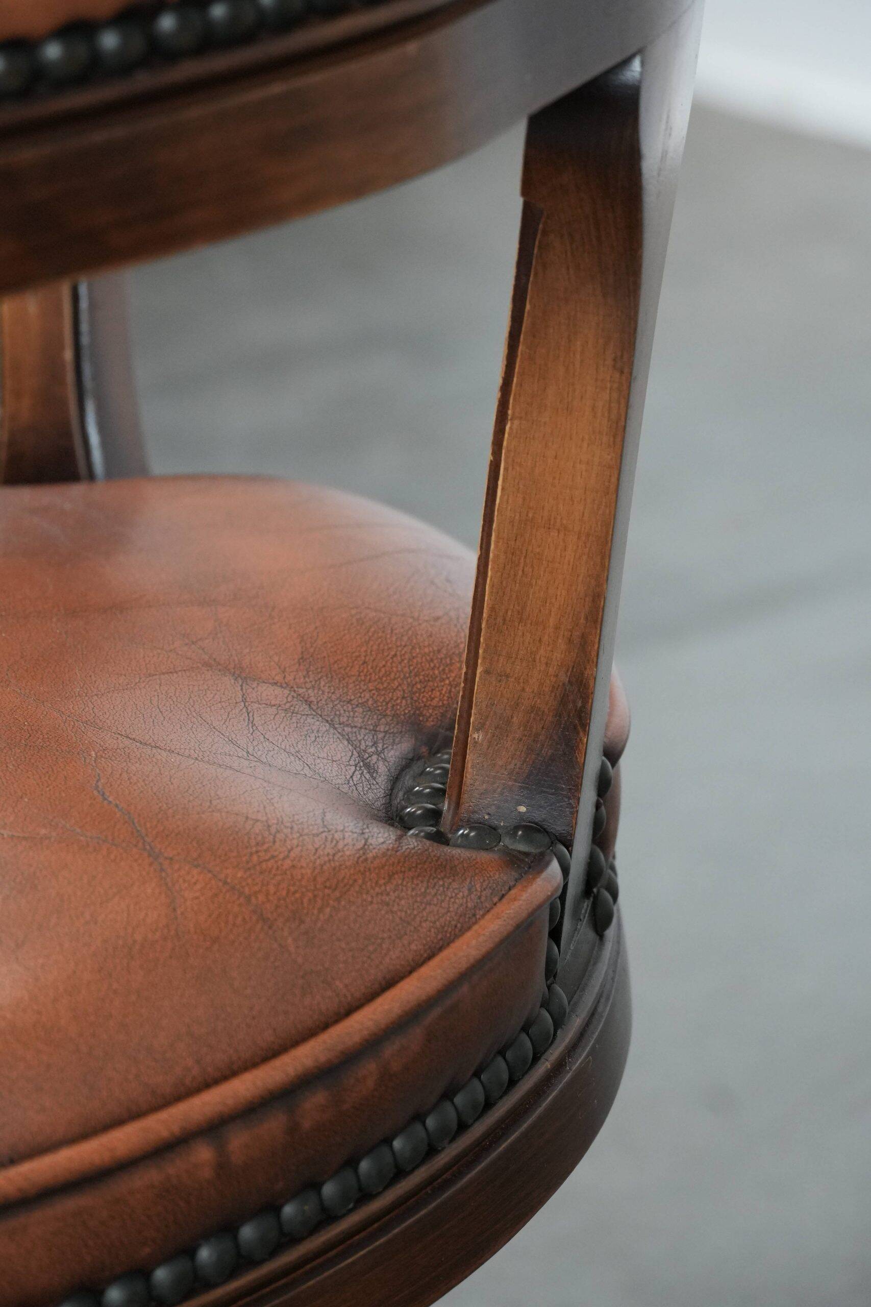 Classic and timeless cow leather and wooden Chesterfield office chair