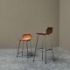 Set of 2 stools "Les Arcs" selected by Charlotte Perriand in leather.
