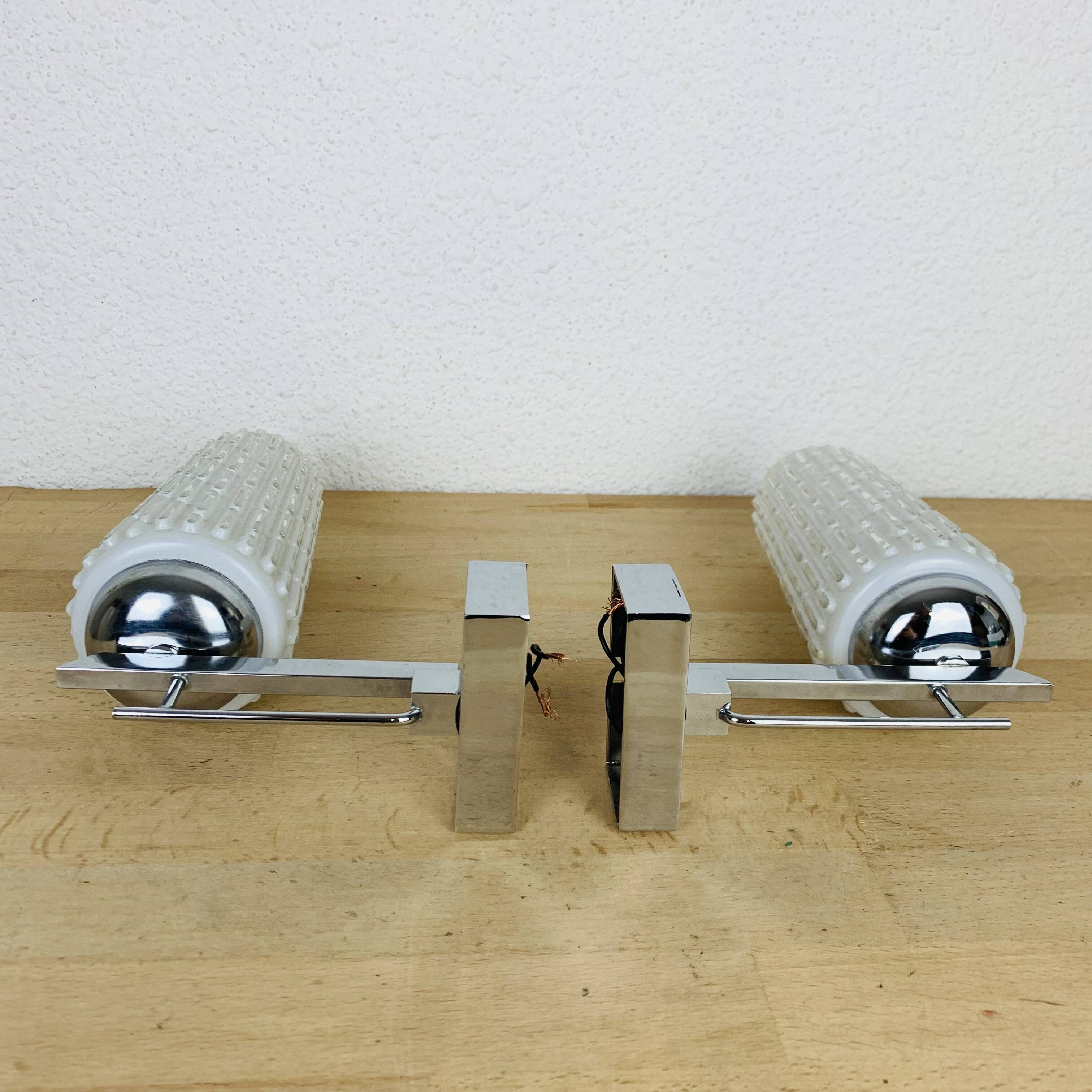 Pair of chrome metal wall lights and opaline tulips from the 70s